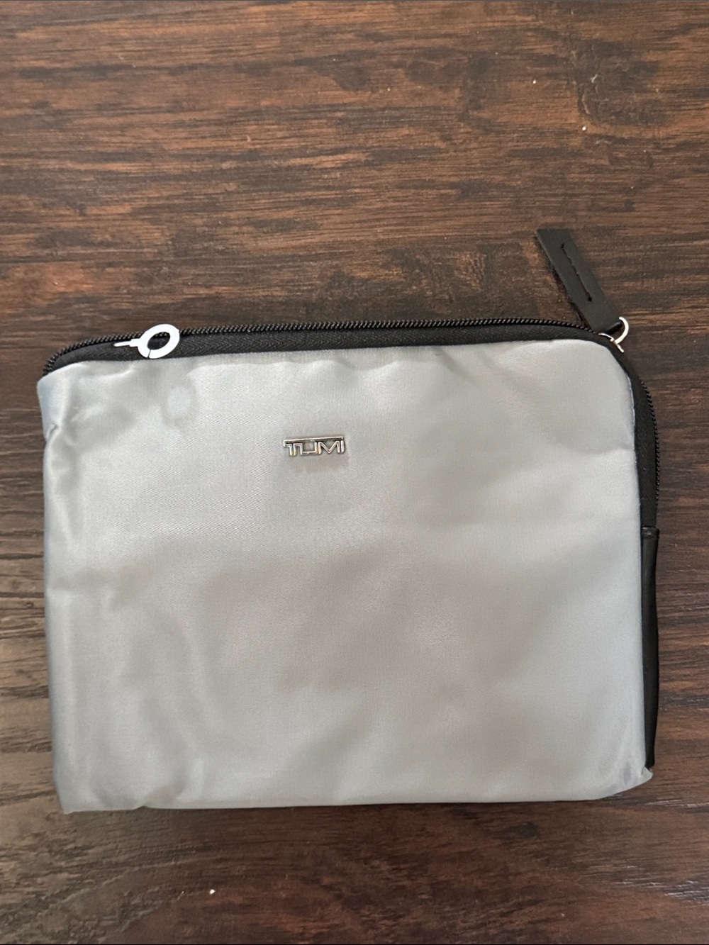 Tumi Silver and Black Toiletry Pouch – Compact Travel Organizer